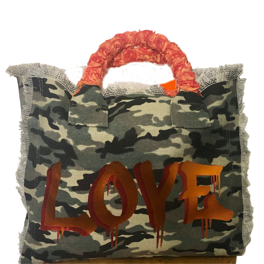 Fringe Camo LOVE Tote - Orange Roses
Fringe Bag Perfect everyday bag! - "Camo LOVE" Canvas Tote with bandanna covered handles and convenient inside zippered pocket measuring 9" X 5" Dimensions: 12"X14"X5" Made in New York
Fringe Camo LOVE Tote - Orange Roses
Camo LOVE" Canvas Tote with bandanna covered handles and convenient inside zippered pocket measuring 9" X 5" Dimensions: 14x13.5x6 Made in New York


$177
$177
$177
camo canvas tote bag, camo canvas totebag with love, camo print, camo print canvas bag,