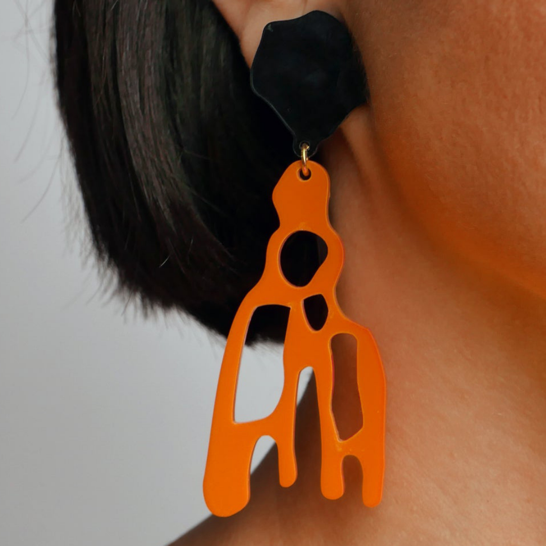 Dante Orange Earrings
Our Dante earrings by Michaela Malin are currently our second best seller in both colors orange and black. Bold and beautiful earrings for a chic and funky look! Made in Israel Material: Acrylic Weight: 25 gram Pierced or Clip-On The Michaela Malin earrings in orange complement the Aura necklace in coral very beautifully.
Dante Orange Earrings
Dante earrings both colors orange & black. Bold & beautiful earrings for a chic & funky look! Made in Israel Material:Acrylic Wt: 25 gram Pierc