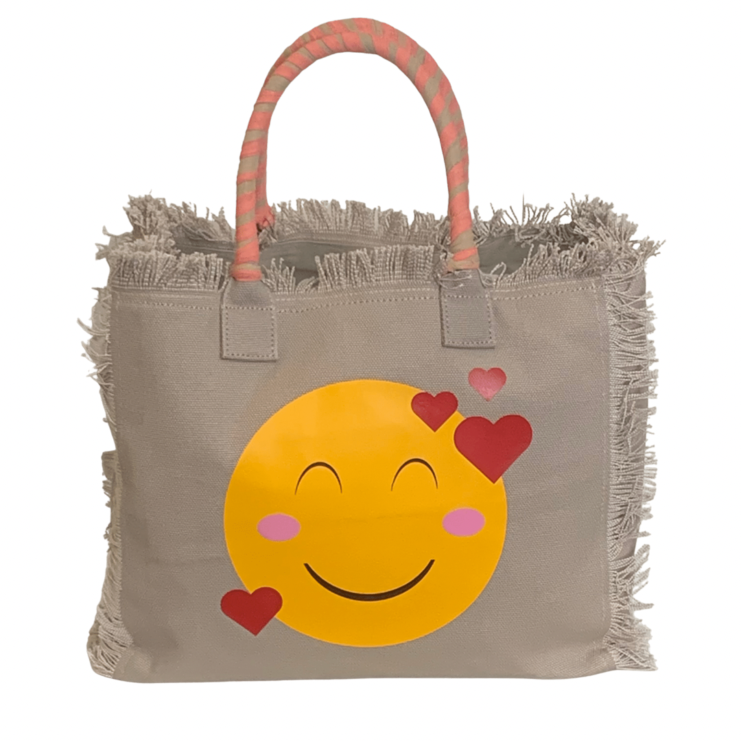 LOVE Emoji Shoulder Tote - Beige
We have improved this best-selling bag! Now larger and roomier it's a shoulder tote and fully lined too! Fringe Bag Perfect everyday bag! - "LOVE Emoji" Fully lined canvas tote with soft-support bottom and bandana covered handles. Inside bag has 1 convenient inside zippered pockets and 2 insert pockets. Bag handles are at 7.5" drop and fits comfortably around the shoulder. Dimensions: 12"X14"X6.5" Made in USA
LOVE Emoji Shoulder Tote - Beige
LOVE Emoji Bag fully lined canvas