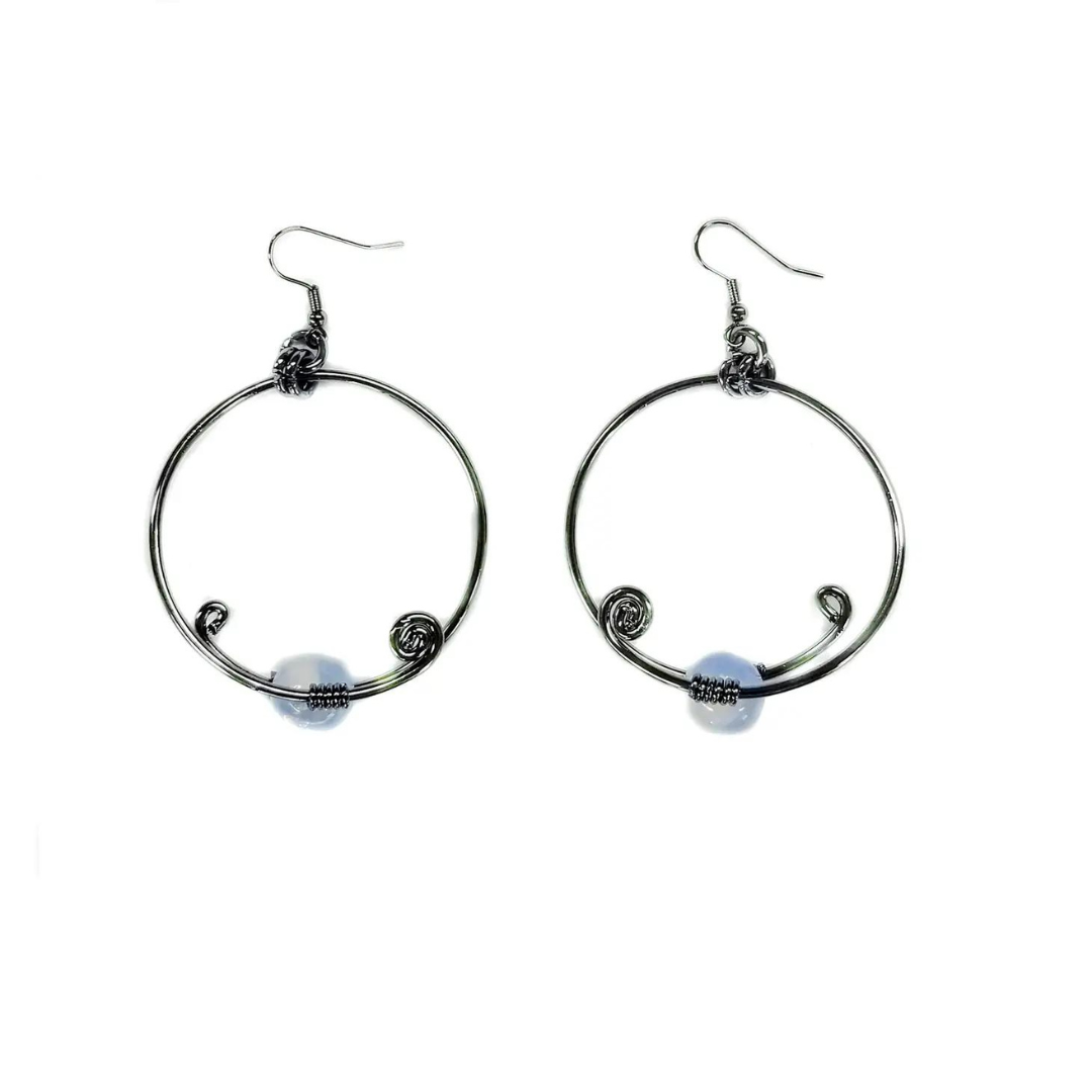 hand made gun metal plated wire earrings are accented opal natural stone. They are a stunning statement piece.  Features: Unique Wire Earrings  One of a kind design Nickel free and hypoallergenic Diameter 1 5/8"
