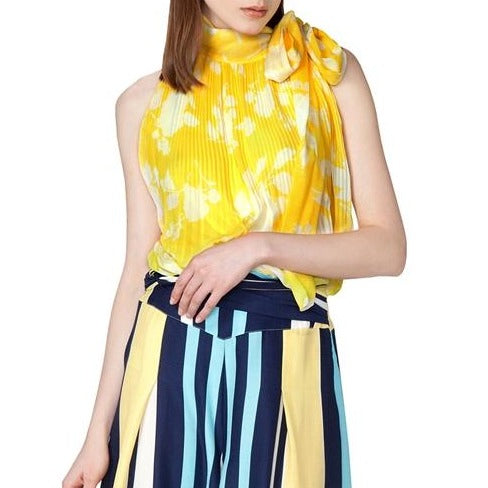 Sleeveless Blouse with Tie Neck
Soft sleeveless blouse with neck tie. Fabric: 100% Polyester SIZE CHART: Small (2/4) Bust: 34 inch, Natural Waist: 26 / 27 inch , Drop Waist: 29 / 30 inch, Hips: 36 / 37 inch Medium (6/8) Bust: 36 inch, Natural Waist: 28 / 29 inch, Drop Waist: 31 / 32 inch, Hips: 38 / 39 inch Large (10-12) Bust: 38 inch, Natural Waist: 30 inch, Drop Waist: 33 inch , Hips: 40 inch
Sleeveless Blouse with Tie Neck
Soft sleeveless blouse with elasticized waistband and neck tie in yellow or black.