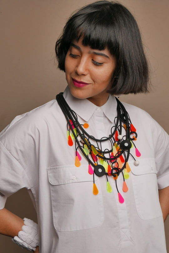 Mobi Neon Necklace
The Mobi Neon Layered Abstract Necklace is made of rubber, yes that's what we said, "rubber." Its accented with muted soft pink and yellow. The necklace celebrates nature and fosters inspiration. It boldly adorns in outfit. Material: Rubber, Acrylic, Resin Clasp: Black resin double hook Length: 23.6 to 31.4 inch / 60 to 80 cm Weight: 96 gram Line Name: The Abstract Line
Mobi Neon Necklace
Material: Rubber, Acrylic, Resin Length;39.3& ;inch / 100 cm Neck opening:&nbsp; 25.5 inch 65 cm Weig