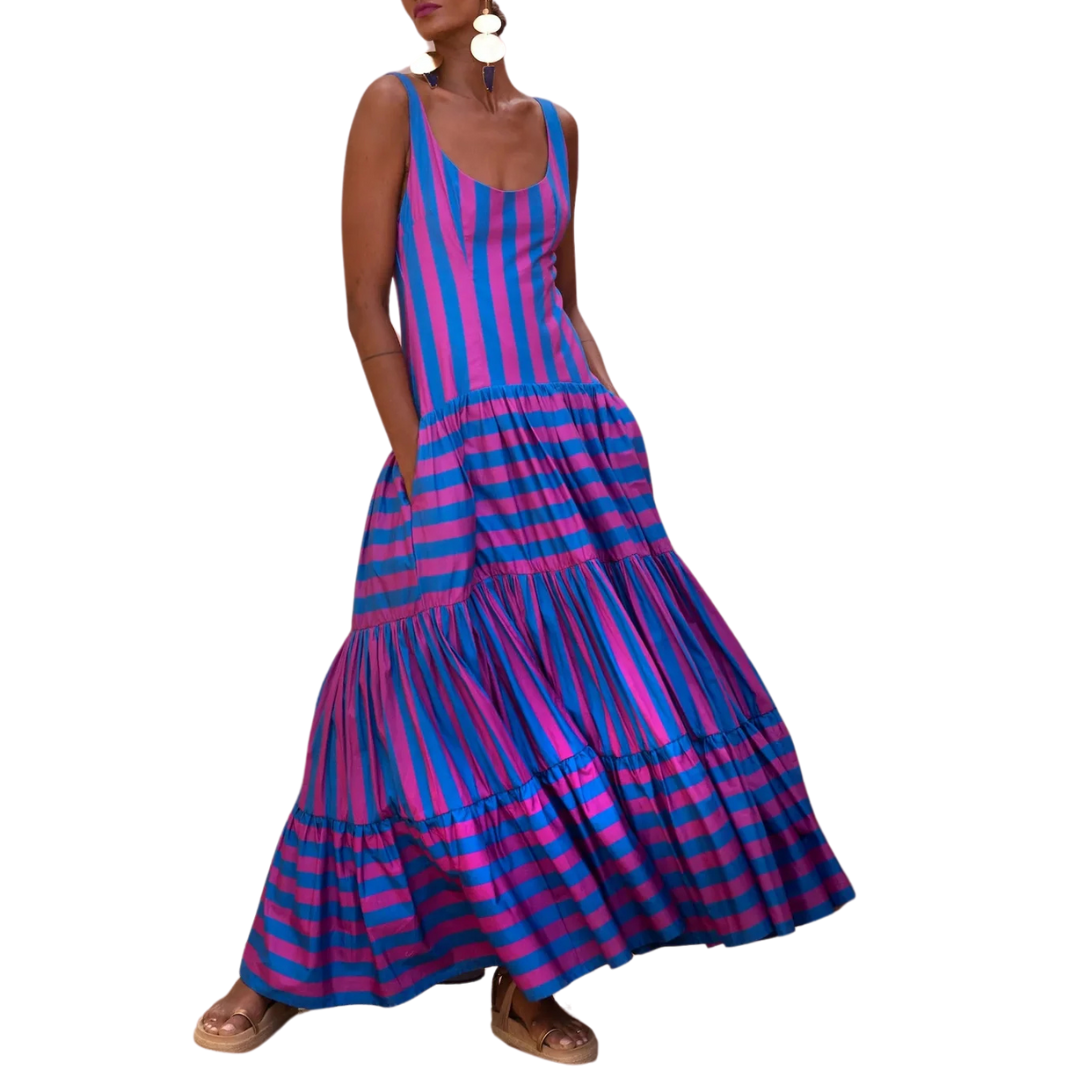 Model wearing fuchsia and indigo striped maxi dress with scoop neck and tiered skirt – Erika Peña Selena Dress