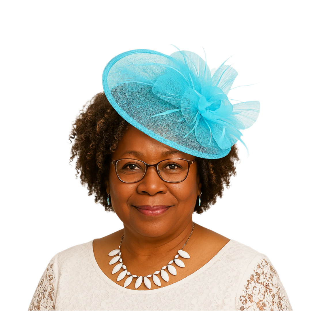 Woman wearing a turquoise decorative headpiece on a white background