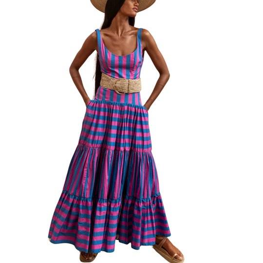 Model wearing fuchsia and indigo striped maxi dress with scoop neck and tiered skirt – Erika Peña Selena Dress
