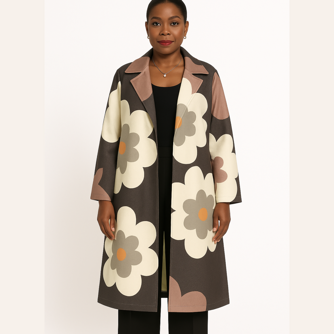 Woman wearing a floral patterned coat on a white background