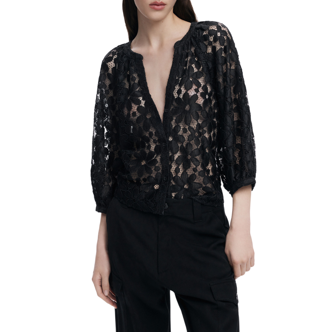 Woman wearing sheer black floral lace blouse with 3/4 sleeves and black tailored trousers – Noir Lace Set