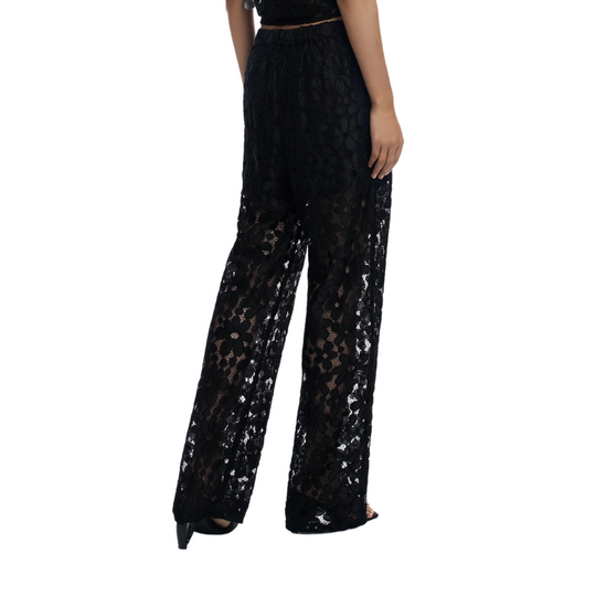 Woman wearing sheer black floral lace blouse with 3/4 sleeves and black tailored trousers – Noir Lace Set