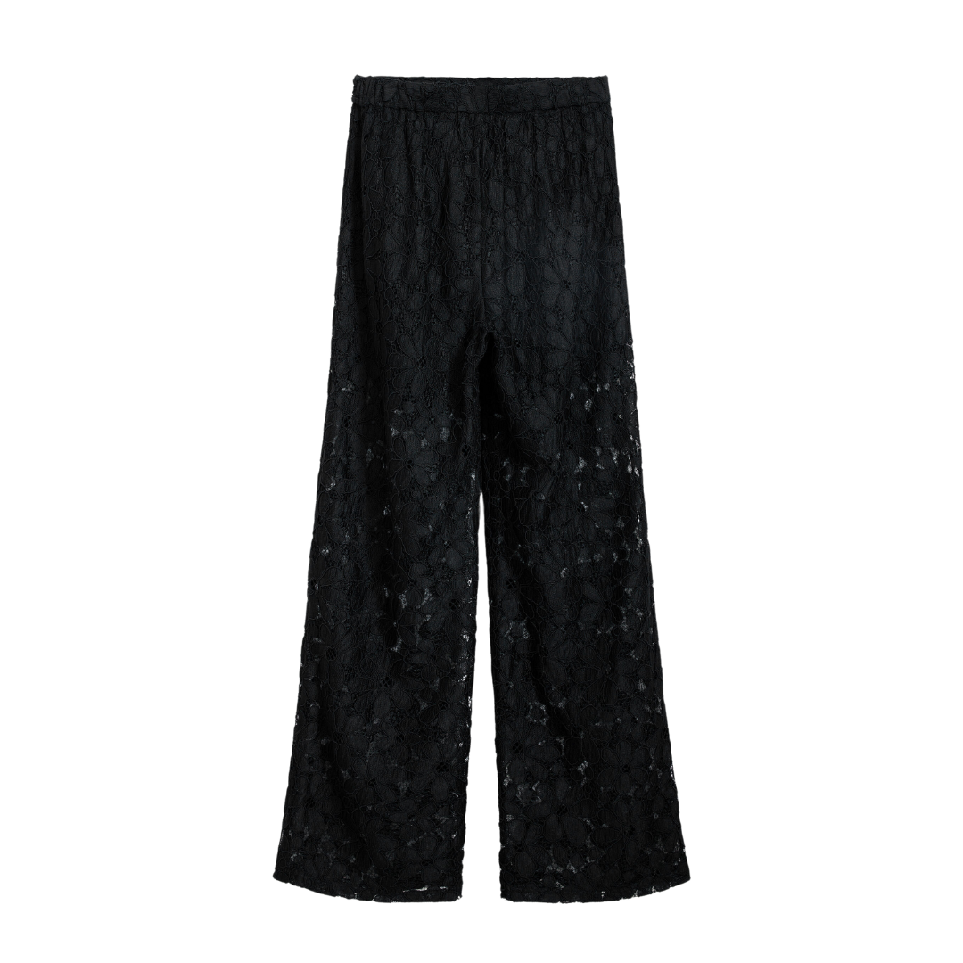 Woman wearing sheer black floral lace blouse with 3/4 sleeves and black tailored trousers – Noir Lace Set