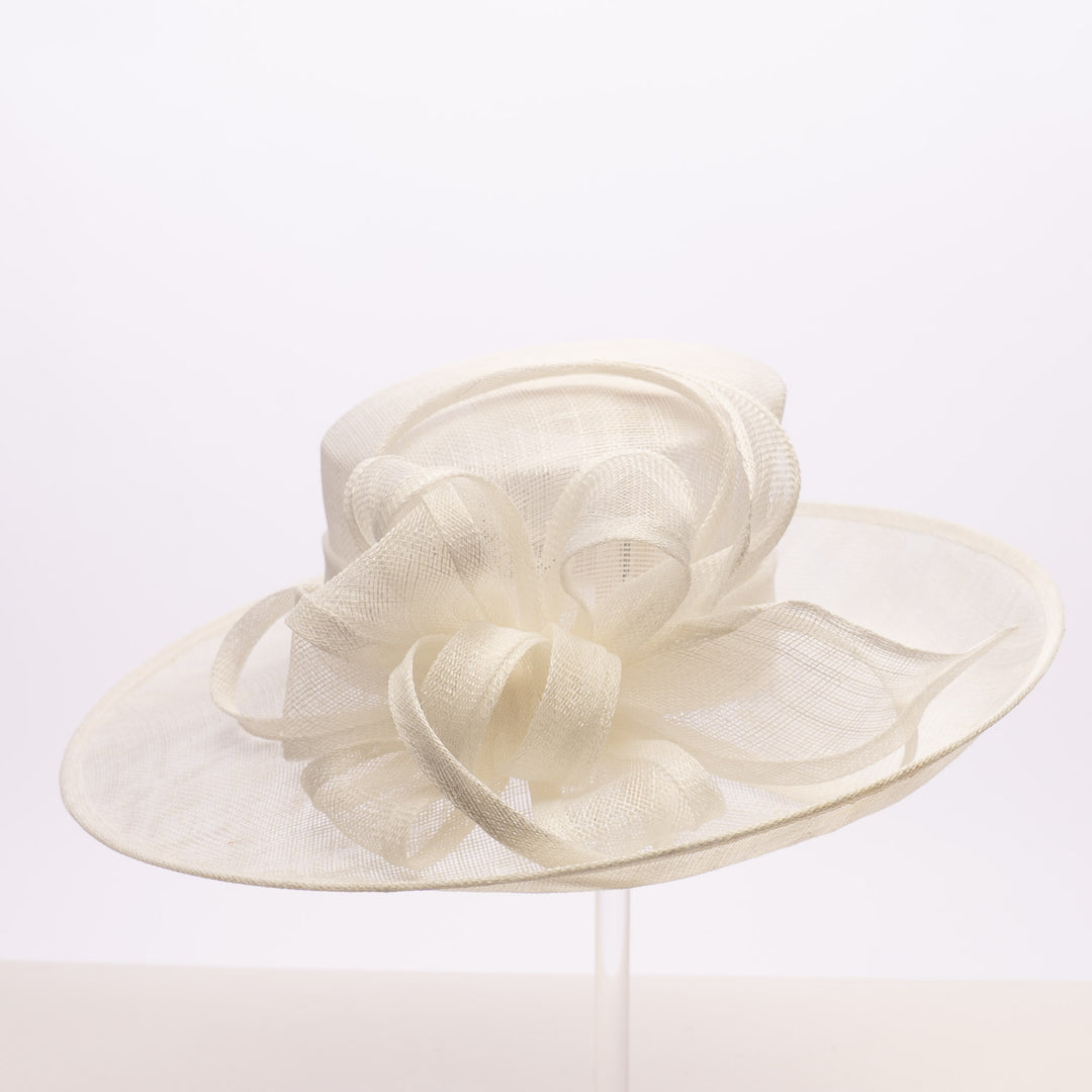 Cream-colored wide-brimmed hat with decorative elements on a white background