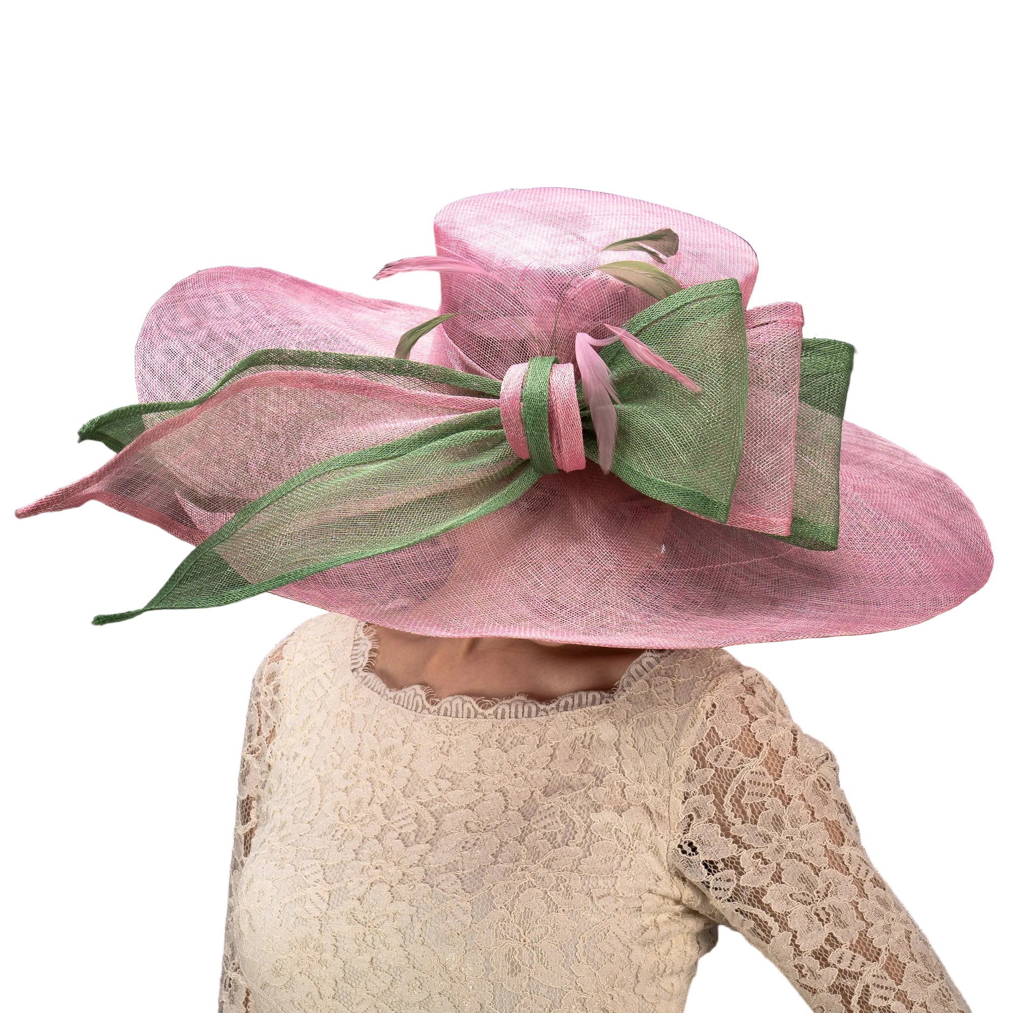 Pink hat with a large green bow on a black background