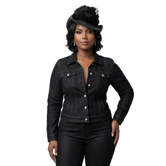 Woman wearing a black denim outfit with a matching hat on a light gray background
