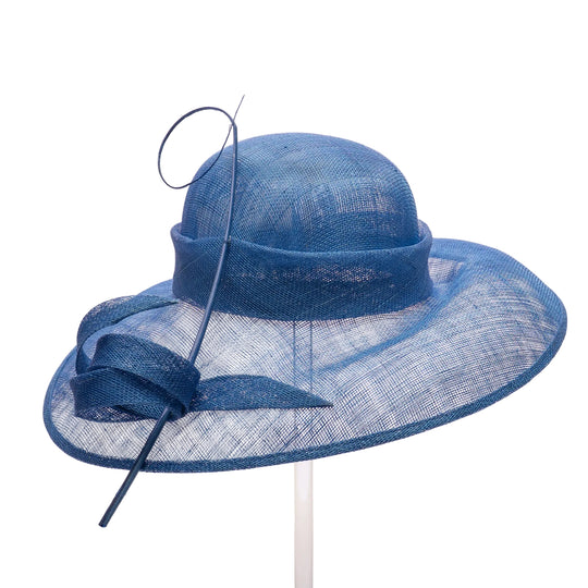 Blue straw hat with decorative bow on a white background