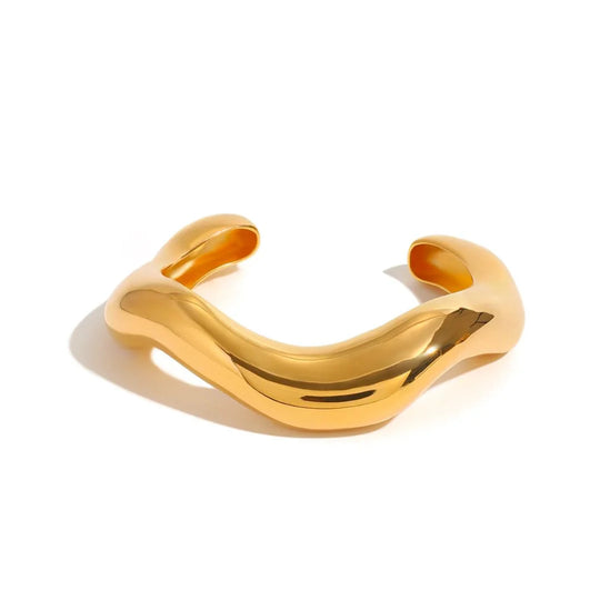 Gold Wave Cuff Bracelet front view – stainless steel with gold plating, 6.5" opening, ¼" wide