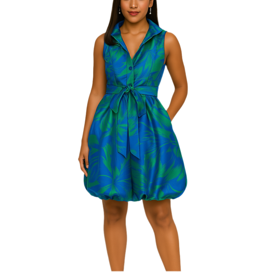 Woman wearing a blue and green patterned dress on a white background