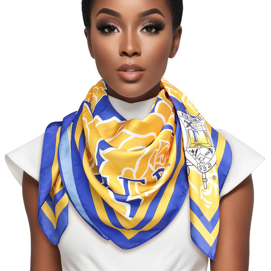 Woman wearing a blue and yellow patterned scarf on a white background