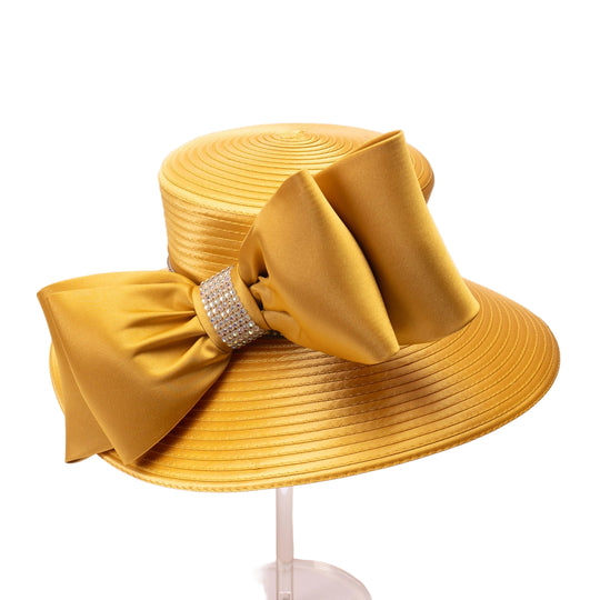 Yellow hat with a large bow on a white background