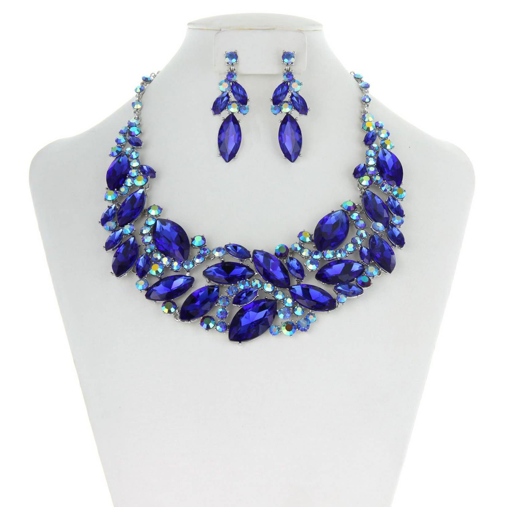 A mannequin showcasing a royal blue marquise rhinestone leaf cluster necklace and matching earrings.