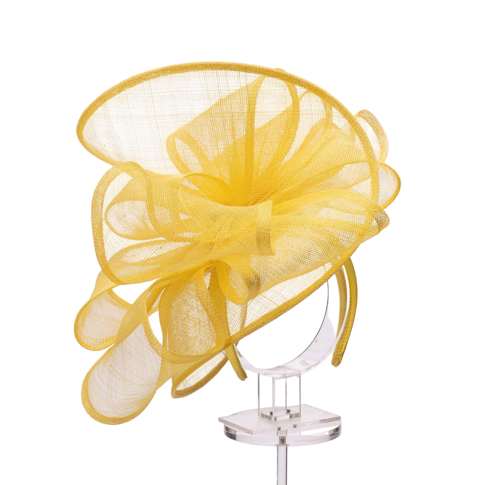 Yellow mesh hat on a clear stand against a white background