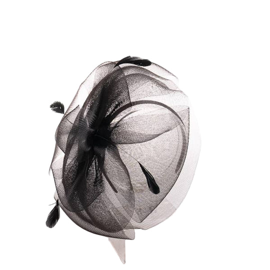 A black crinoline flower headband with a feather trim displayed on a stand.