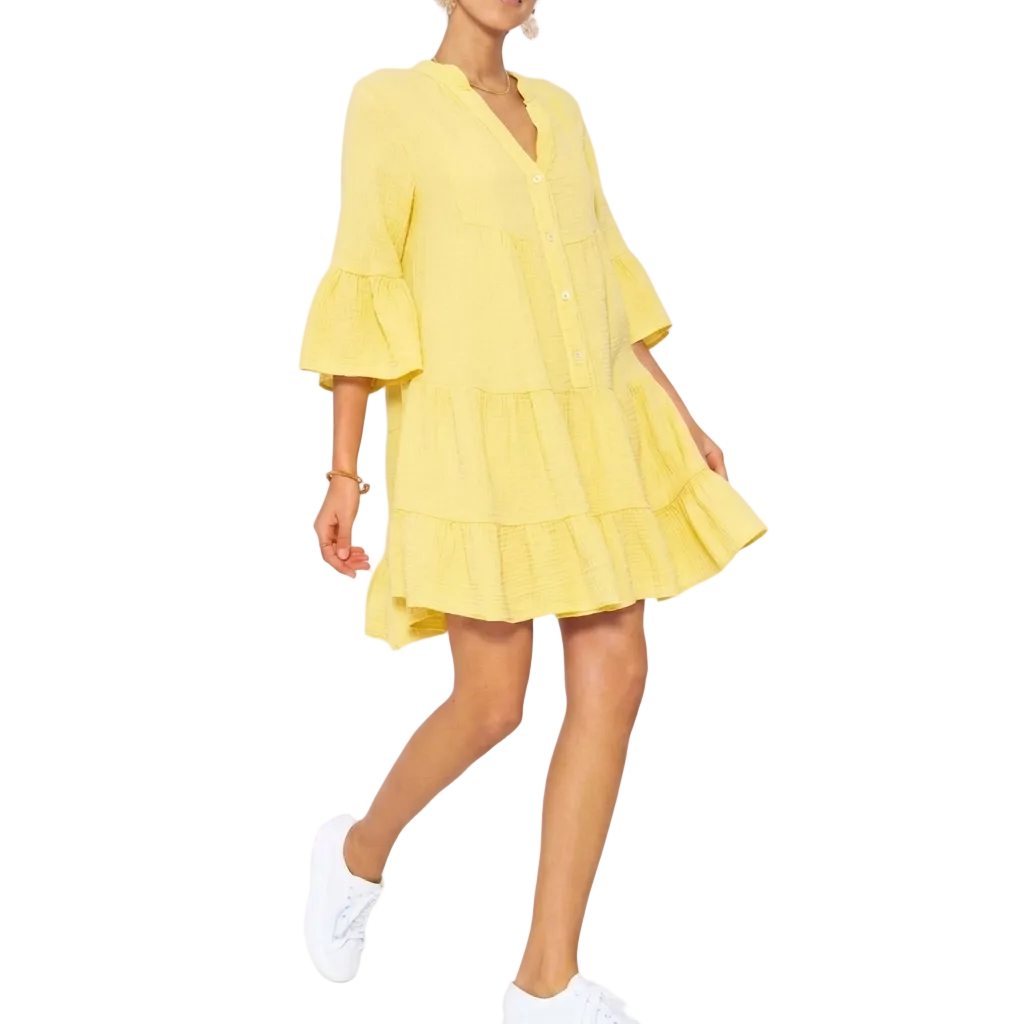 Yellow dress worn by a person on a white background