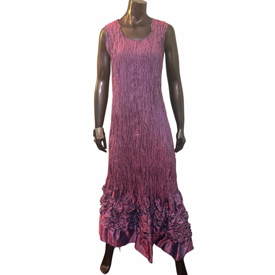 Purple patterned dress on a mannequin against a white background