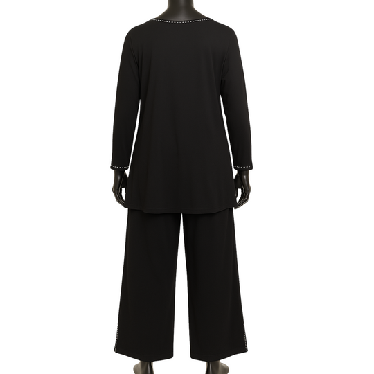 Black outfit on a mannequin with a plain white background