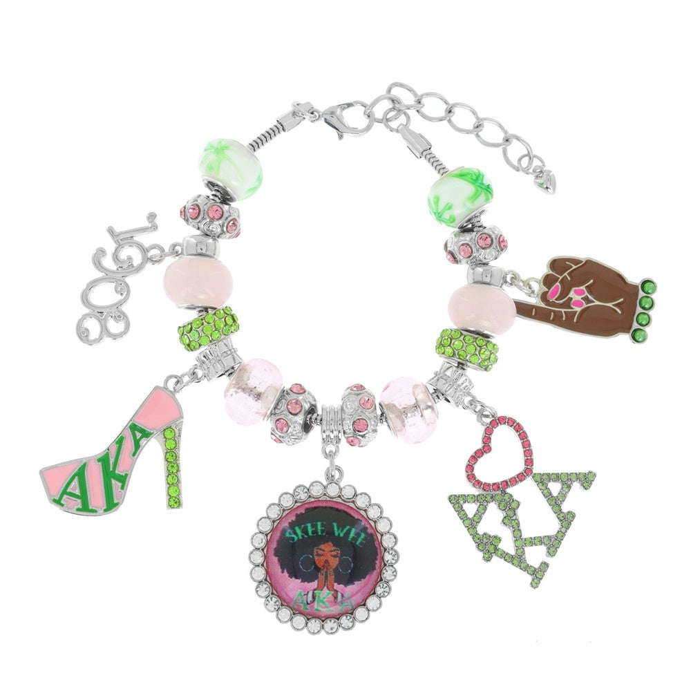 Alpha Kappa Alpha adjustable multi-charm bracelet with enamel AKA charms and pink and green crystal beads.