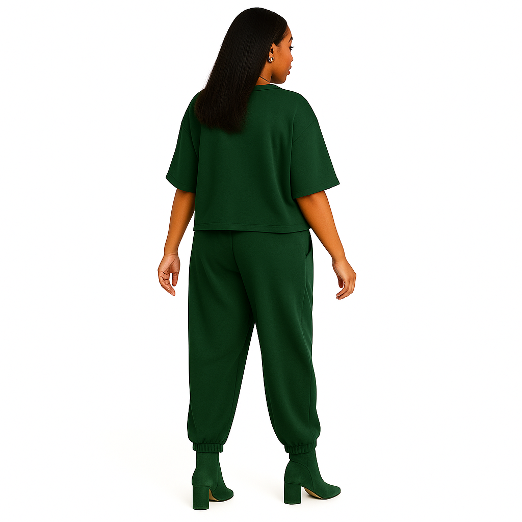 Person wearing a green outfit on a white background