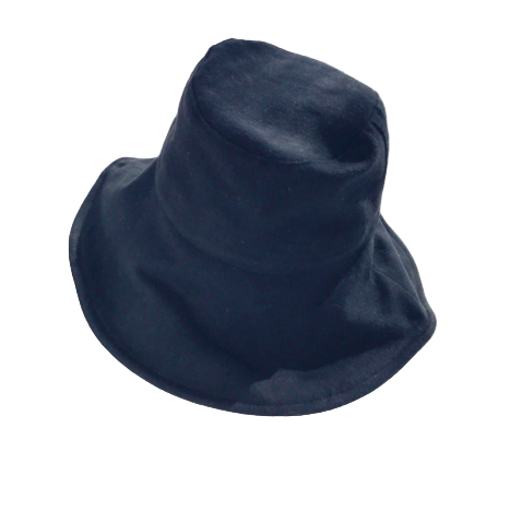Black bucket hat on a light gray surface
