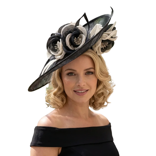 Woman wearing a black and white decorative hat outdoors.