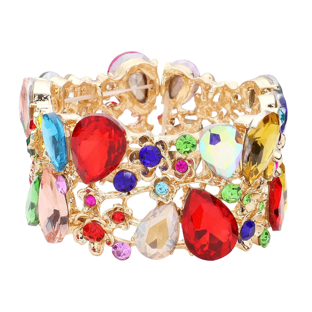 Colorful gemstone bracelet with gold accents on a light gray background