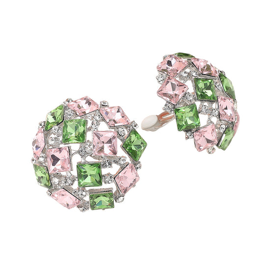 Pair of earrings with pink and green gemstones on a white background