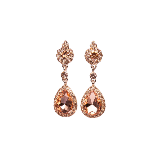 Rose gold earrings with teardrop-shaped gemstones on a white background