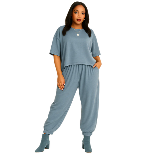 Woman wearing a blue outfit on a beige background