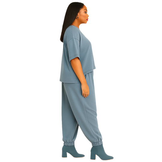 Woman wearing a blue outfit on a white background