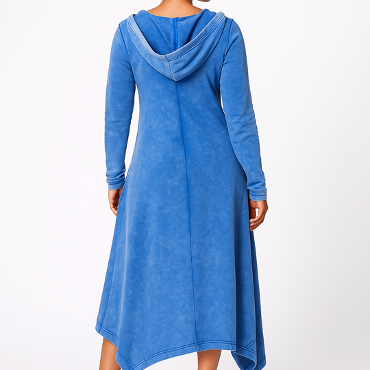 Woman wearing a blue dress with a hood on a white background