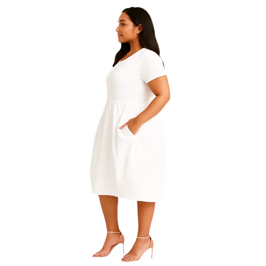 Woman wearing a white dress on a white background