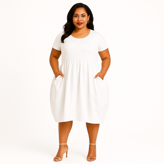 Woman wearing a white dress on a white background