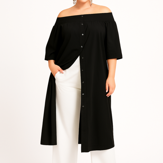 Woman wearing a black off-shoulder top and white pants on a white background