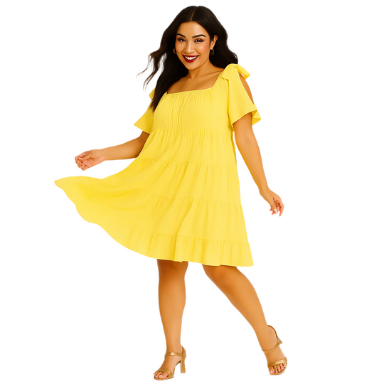Yellow off-shoulder crinkly babydoll dress with bow tie sleeves and tiered layers, laid flat