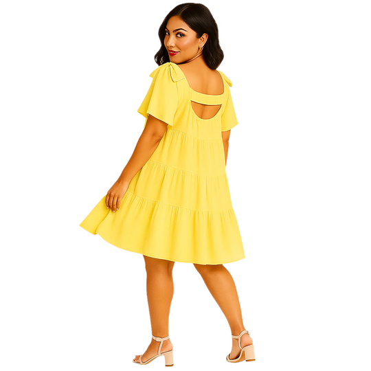 Yellow off-shoulder crinkly babydoll dress with bow tie sleeves and tiered layers, laid flat
