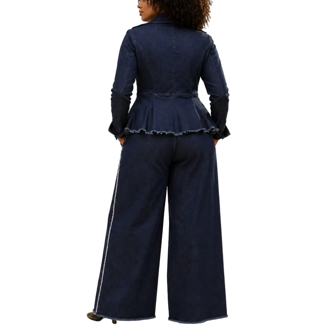 Woman wearing a navy blue peplum top and wide-leg pants on a beige background