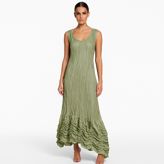 Woman wearing a green dress on a white background
