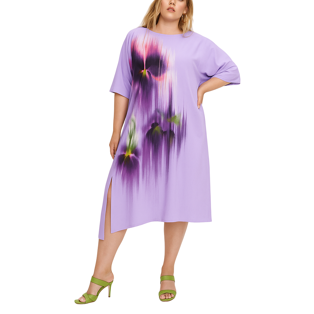 Woman wearing a purple dress with floral design on a white background