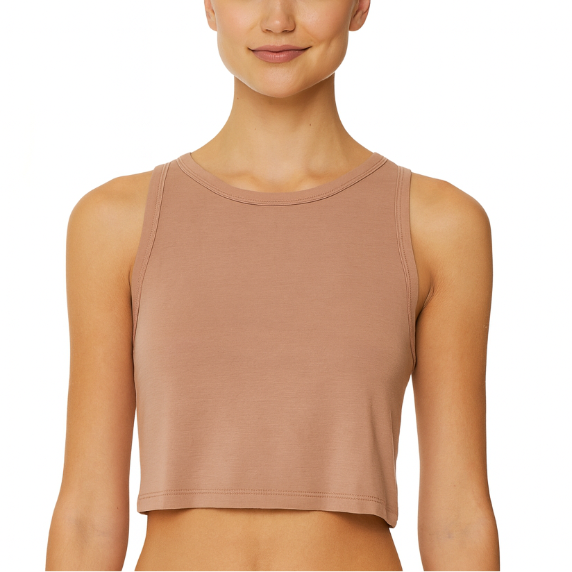 Woman wearing a beige tank top on a white background
