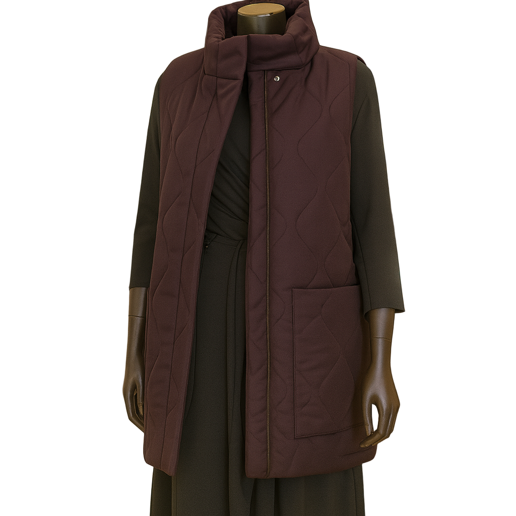 Mannequin wearing a dark brown quilted vest in a clothing store setting