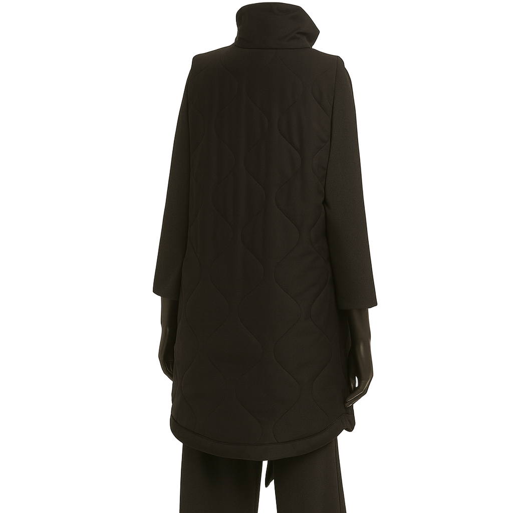 Person wearing a black coat and pants on a white background