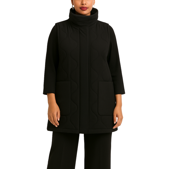 Woman wearing a black coat on a white background