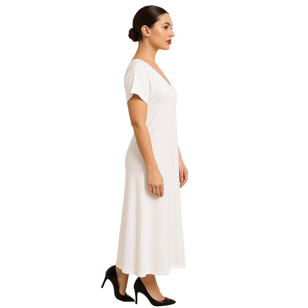 Woman wearing a white dress against a beige background